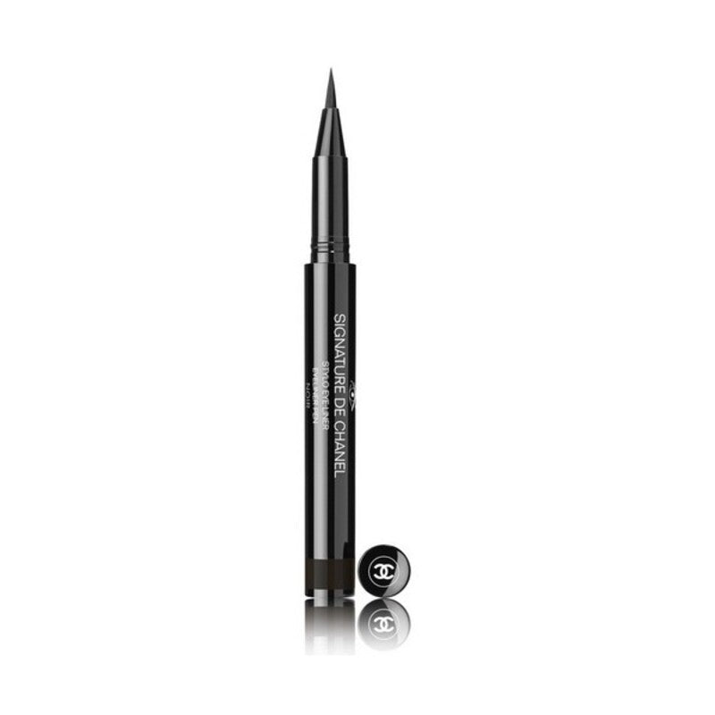  A sleek black tube of Chanel Signature De Chanel eyeliner, with the product name and Chanel logo.